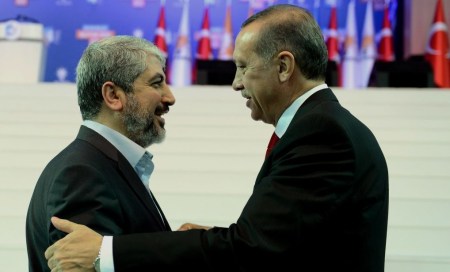 Hamas leader Khalid Mashal shares an embrace with Turkish President Erdogan during a trip to Turkey last week