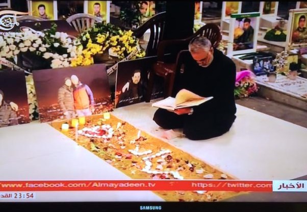 A snapshot from Iranian TV showing Soleimani at the grave of friend in Lebanon this past week.