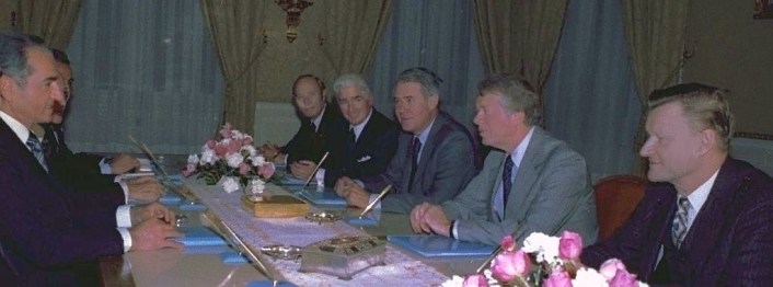 The Shah of Iran meets with Zbigniew Brzezinski (far right), senior security advisor to U.S. President Jimmy Carter (second from right) in 1977.
