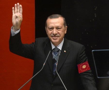 A possible glimpse of the future?  Erdoğan addressing his people, wearing the seal of the imperial presidency, shouting Hail Erdoğan!