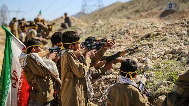 Children soldiers of the Basij training. Note the cross of David as a target in the upper right corner.