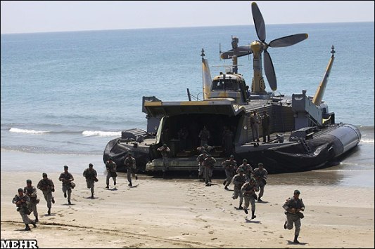 Iranian "marines" being deployed on a beach in an earlier naval exercise. Their landing craft is a BH7 hovercraft.